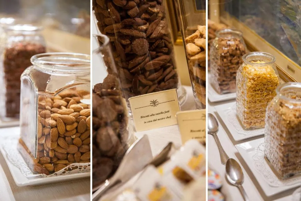 Dettaglio buffet colazione con mandorle, biscotti fatti in casa e cereali